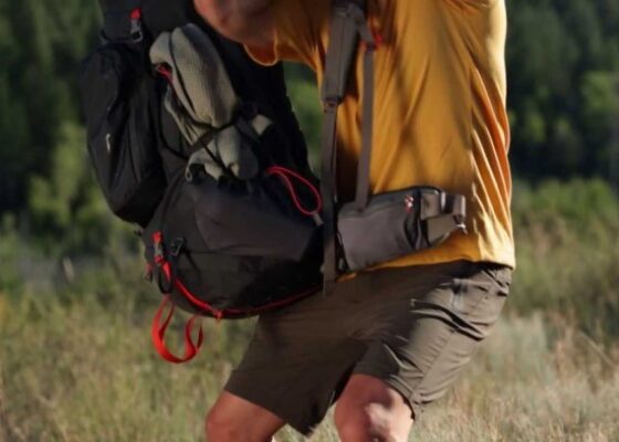 how to wear backpacking pack